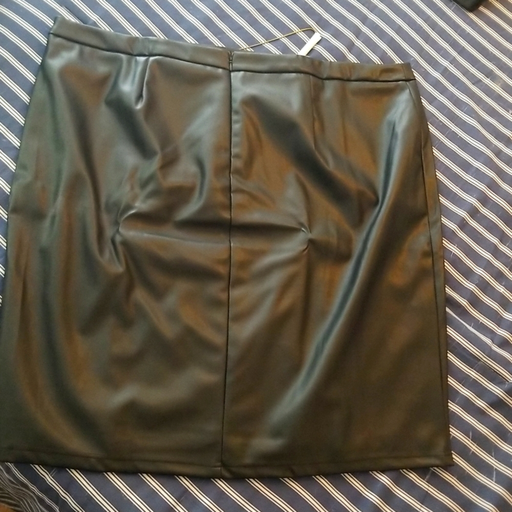 Black Leather Skirt with zipper and split in back. Size 28